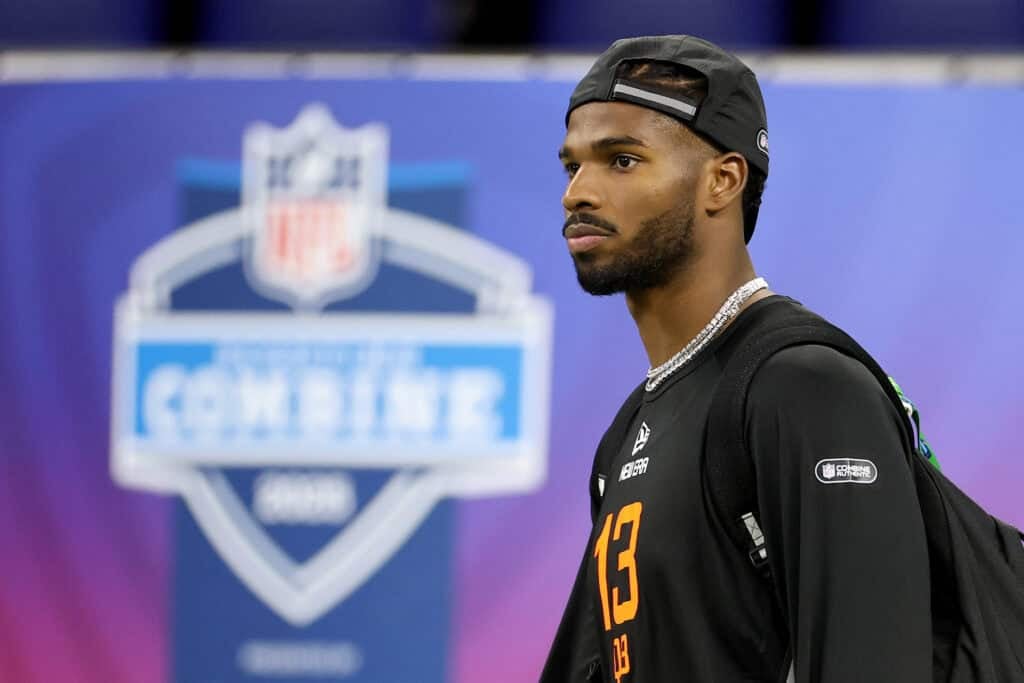 INDIANAPOLIS, INDIANA - MARCH 01: Shedeur Sanders #QB13 of Colorado looks on during the NFL Scouting Combine at Lucas Oil Stadium on March 01, 2025 in Indianapolis, Indiana.