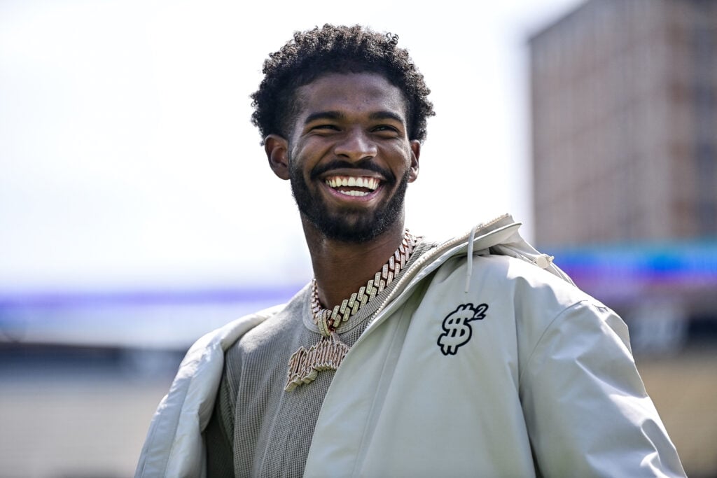 BOULDER, CO - APRIL 19: Former Colorado Buffaloes quarterback Shedeur Sanders looks on during a ceremony to retire his jersey before the Black and Gold Spring Game at Folsom Field on April 19, 2025 in Boulder, Colorado.